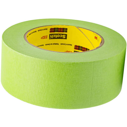 A roll of bright green 3M Scotch 233+ premium automotive masking tape lying flat on a white background.