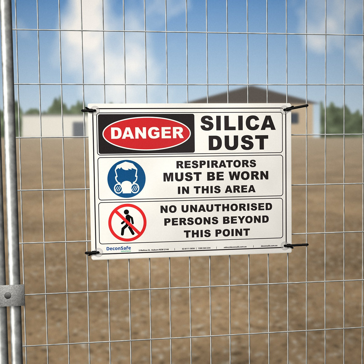 Danger Silica Dust Respirators Must Be Worn sign cable-tied to a temporary site fence