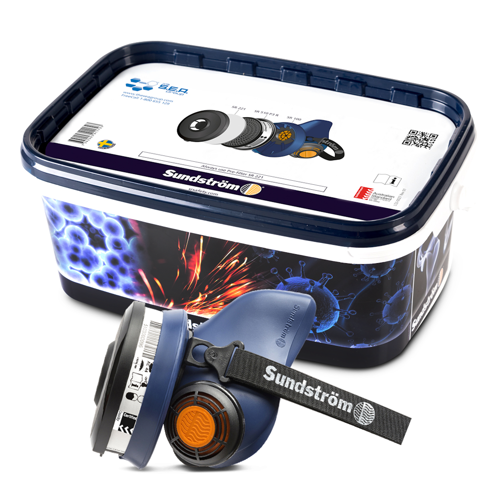 A blue Sundström SR 100 half-mask respirator with an attached filter kit, positioned in front of its plastic storage container featuring an exploded assembly diagram on the lid.