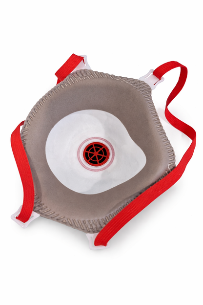 An interior view of a respirator mask, showing the grey filter material, the red circular exhalation valve assembly, and red elastic straps.