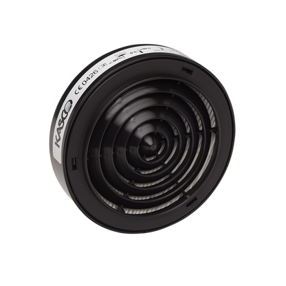 Circular Kasco respirator filter cartridge with a black concentric grille and a white label showing safety specifications.