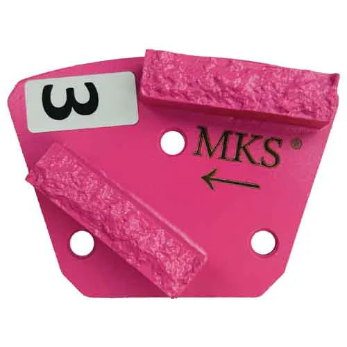 A pink, fan-shaped MKS diamond grinding segment with two abrasive bars and a label marked with the number "3."