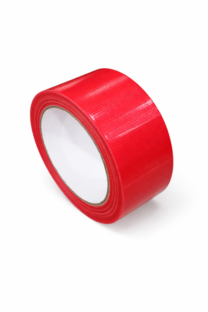 A roll of bright red cloth duct tape on a white background with a plain white inner core.